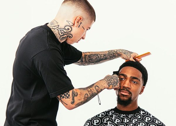 VicBlends displaying his exceptional barber skills at VicBlends Barber Academy.